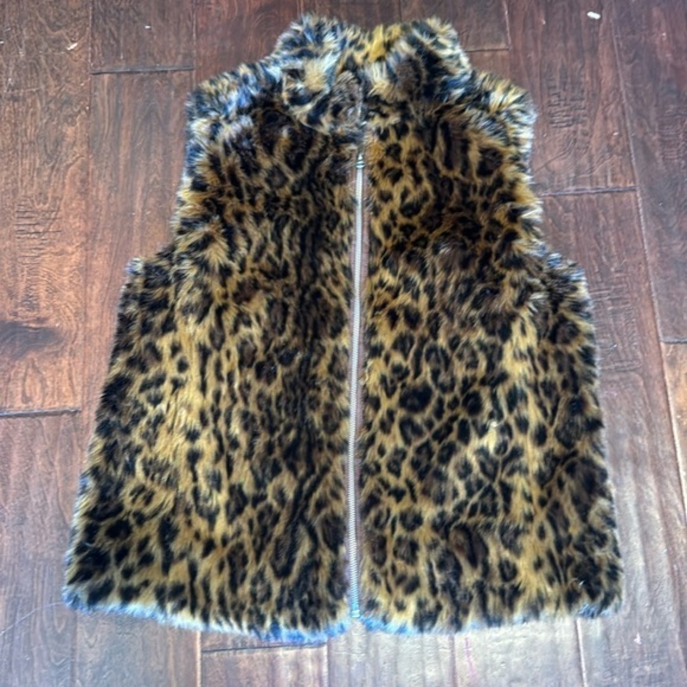 J. Crew furry vest cheetah print with a zipper closure and collar silky lining